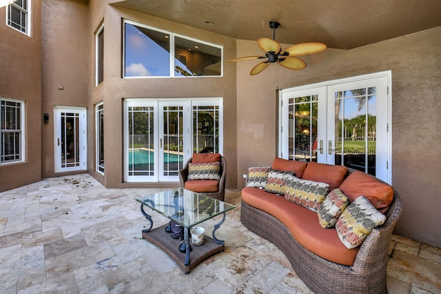 view of patio / terrace featuring outdoor lounge area, french doors, and ceiling fan