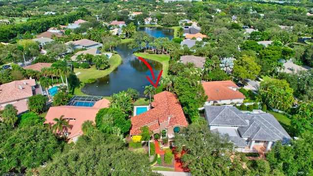 birds eye view of property featuring a water view