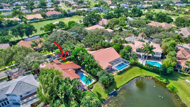 bird's eye view with a water view