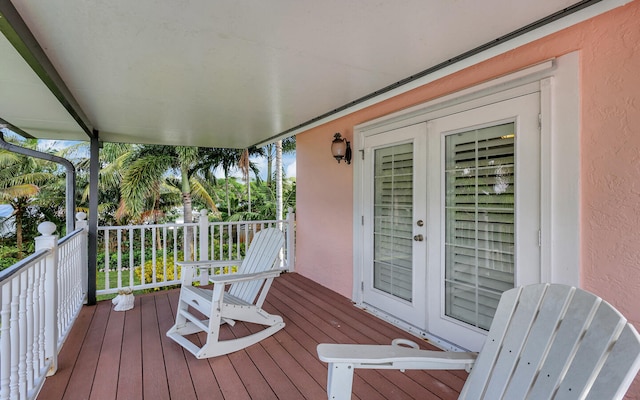 wooden terrace featuring french doors