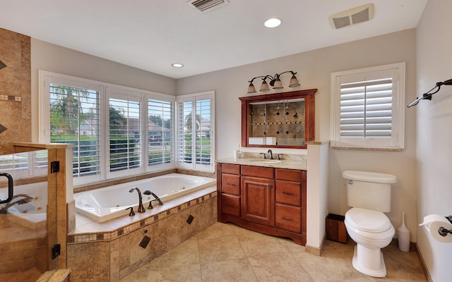 full bathroom featuring vanity, toilet, shower with separate bathtub, and plenty of natural light