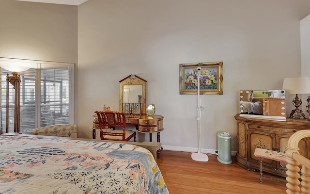 bedroom with light wood-type flooring