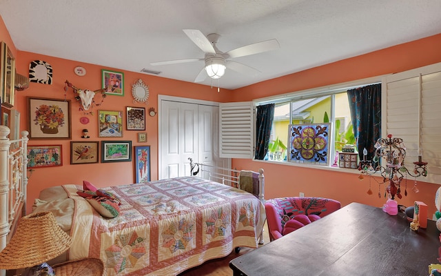 bedroom featuring a closet and ceiling fan