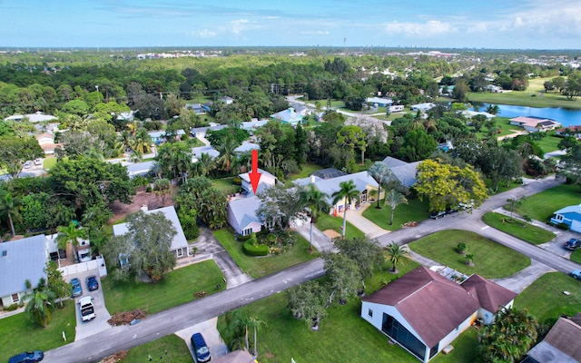 bird's eye view with a water view