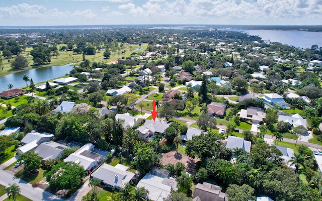 drone / aerial view with a water view