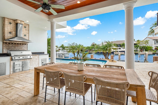 view of patio / terrace featuring grilling area, area for grilling, a water view, and ceiling fan