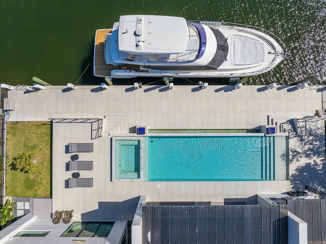 bird's eye view with a water view