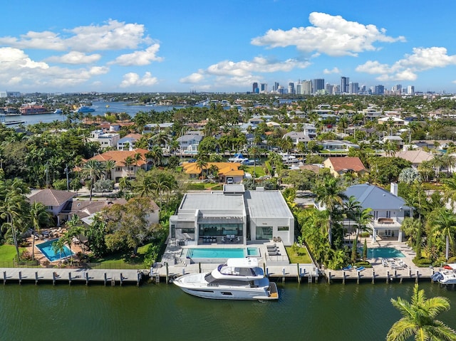 birds eye view of property featuring a water view