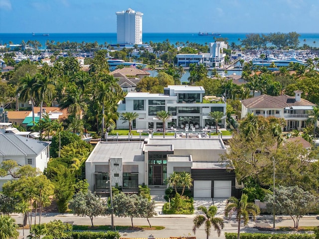 birds eye view of property featuring a water view