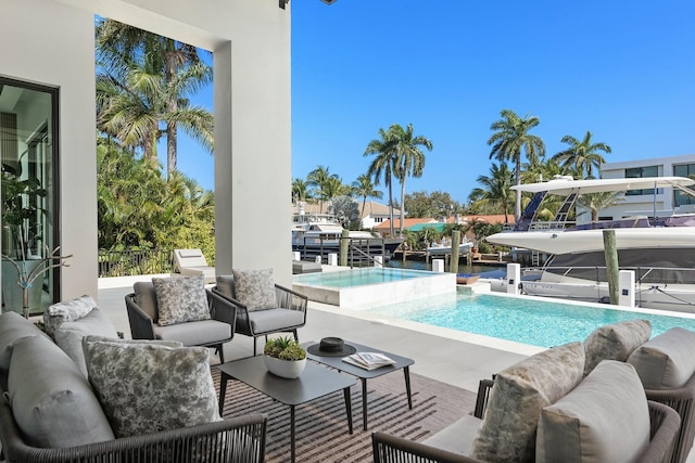 view of swimming pool featuring an outdoor hangout area and a patio area