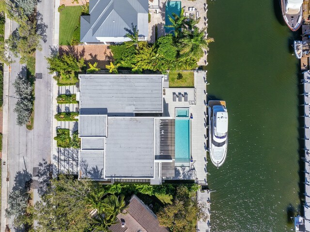 bird's eye view with a water view