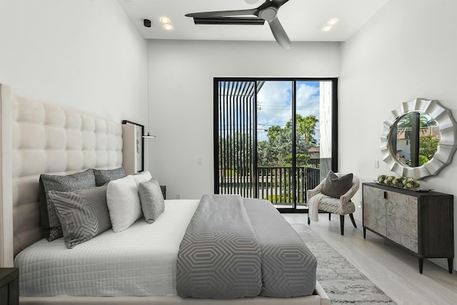 bedroom featuring light wood-type flooring, ceiling fan, and access to exterior