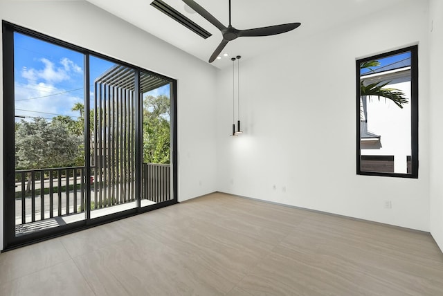 empty room featuring ceiling fan