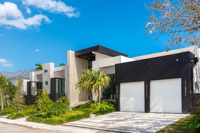 modern home featuring a garage