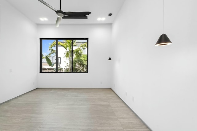 spare room featuring ceiling fan