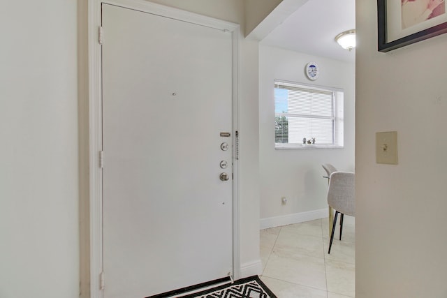 view of tiled foyer entrance