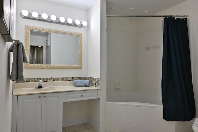 full bathroom with tile patterned flooring, vanity, toilet, and shower / tub combo