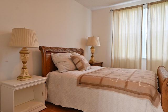 bedroom featuring hardwood / wood-style flooring