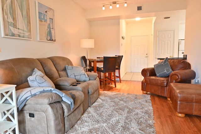 living room with hardwood / wood-style floors