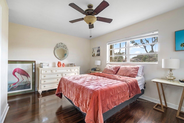 bedroom featuring dark hardwood / wood-style floors and ceiling fan