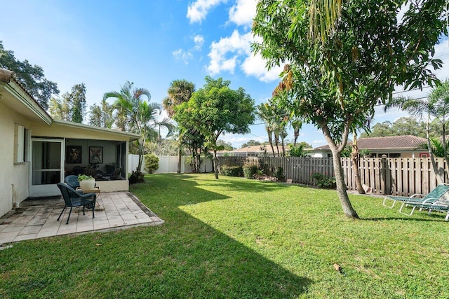 view of yard with a patio area