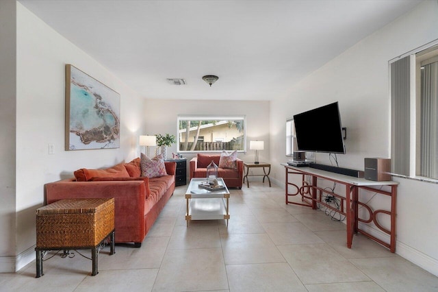 living room featuring light tile patterned floors