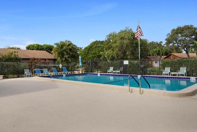 view of swimming pool featuring a patio