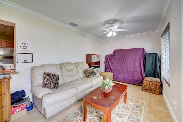 tiled living room featuring crown molding and ceiling fan