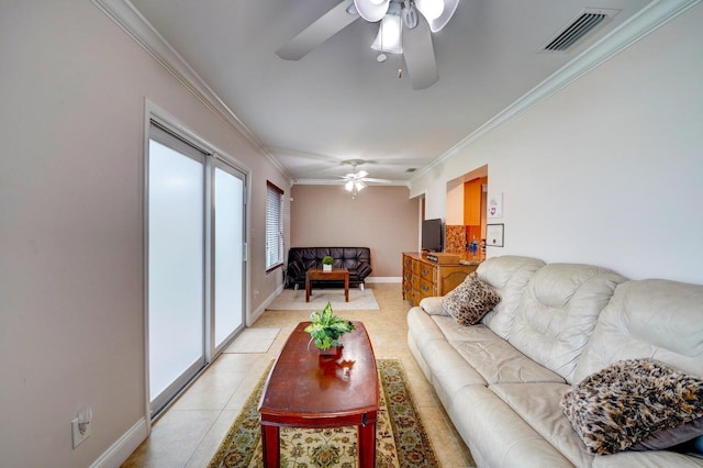 tiled living room featuring ceiling fan and crown molding