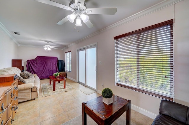 tiled living room with ceiling fan and ornamental molding