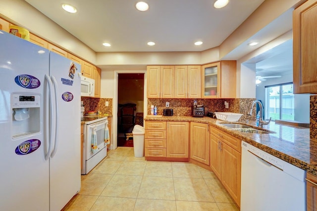 kitchen featuring ceiling fan, sink, light brown cabinets, white appliances, and light tile patterned floors