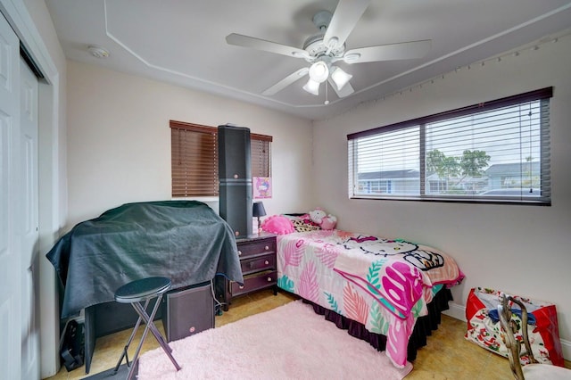 bedroom featuring a closet and ceiling fan