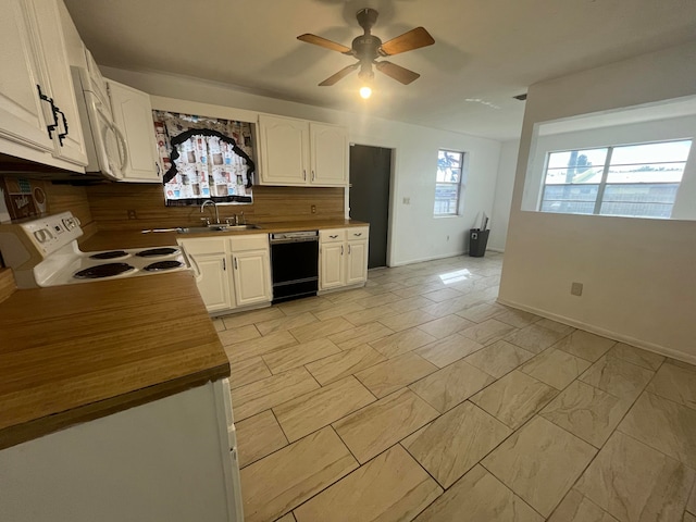 kitchen featuring electric stove, sink, white cabinets, dishwasher, and ceiling fan