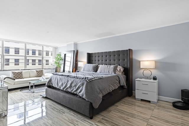 bedroom featuring crown molding