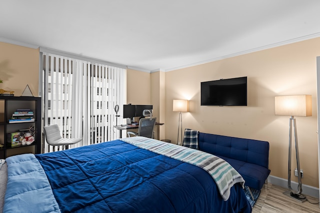 bedroom with ornamental molding