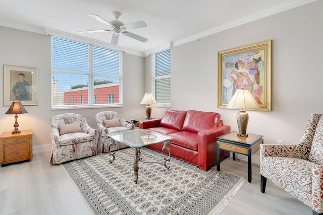 living room with ceiling fan, hardwood / wood-style flooring, and ornamental molding