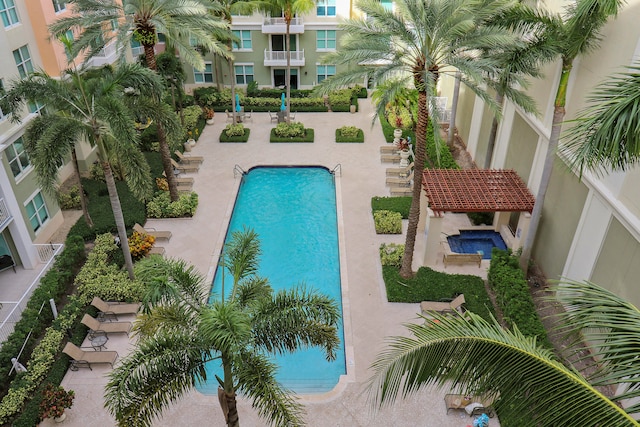 view of swimming pool featuring a patio area