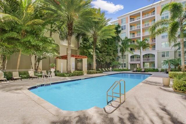 community pool with a patio