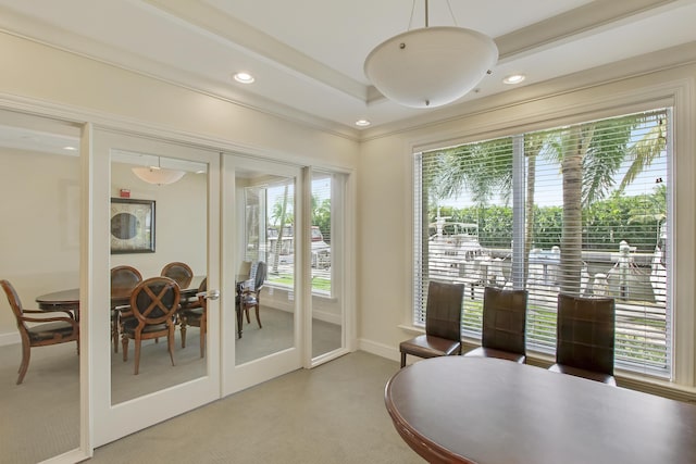 doorway to outside with light colored carpet, french doors, recessed lighting, and baseboards