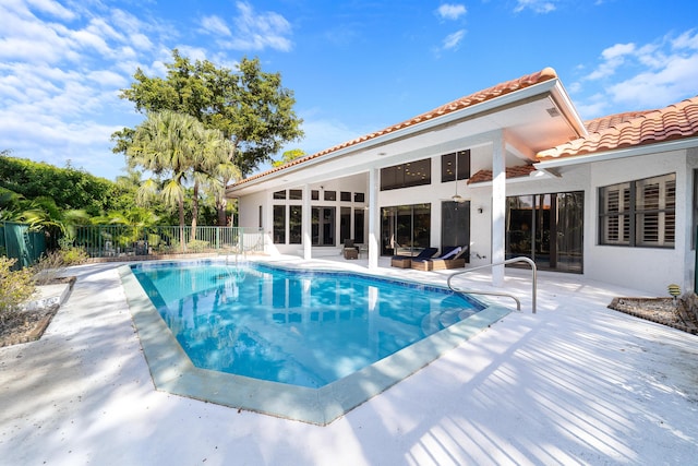 view of pool featuring a patio