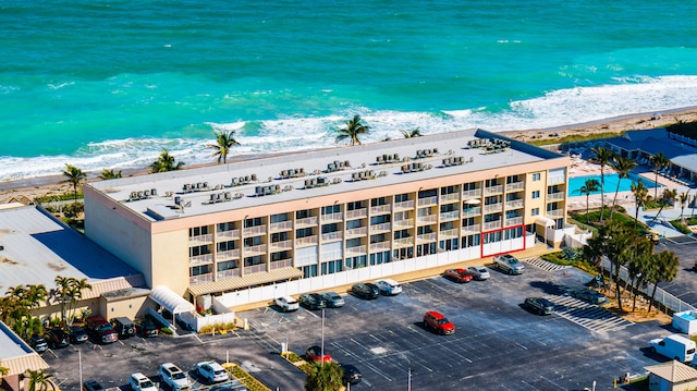 aerial view with a beach view and a water view