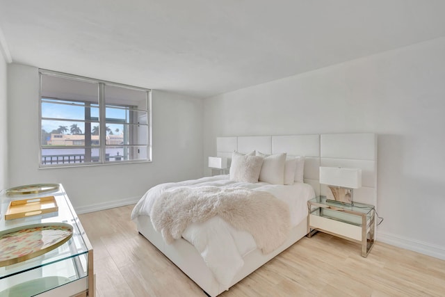 bedroom featuring light wood-type flooring