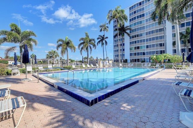 view of swimming pool with a patio