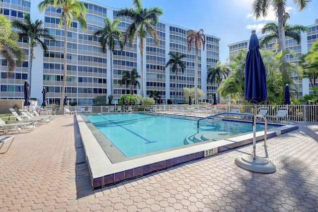 view of swimming pool featuring a patio