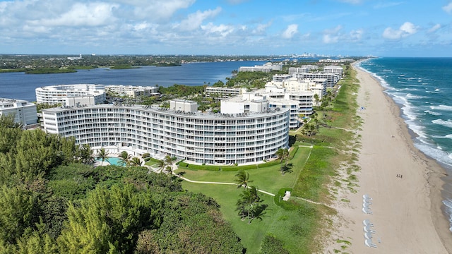 drone / aerial view with a view of the beach and a water view