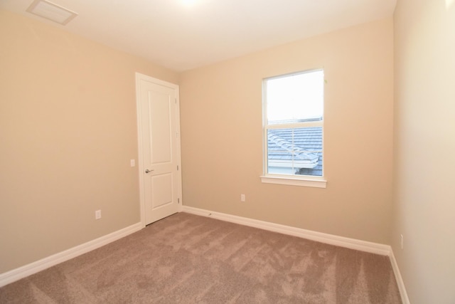 view of carpeted spare room