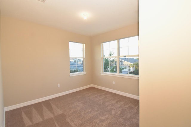 view of carpeted spare room