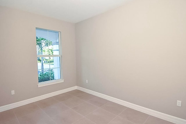 view of tiled spare room