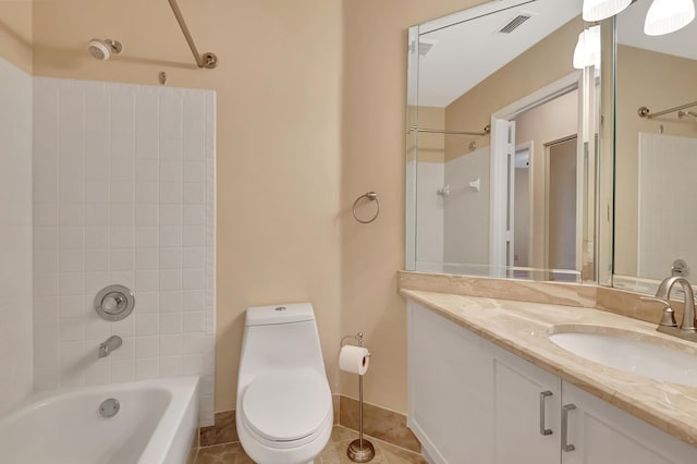 full bathroom featuring tile patterned floors, vanity, toilet, and tiled shower / bath