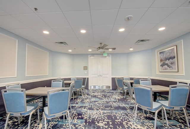 dining room with ceiling fan and carpet floors